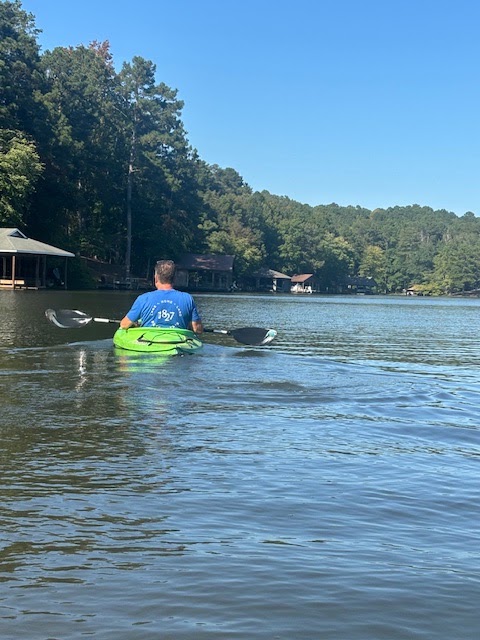 Kayaking on Lake Harding, home of 1827 Real Estate brokers Terri and Jamie Griffis